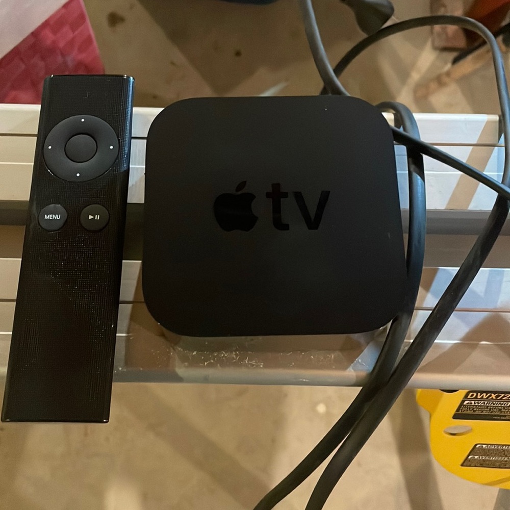 Apple TV with remote and cord